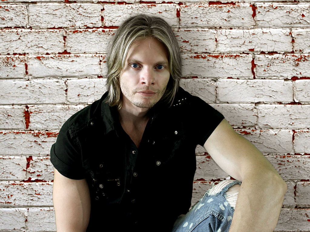 Davey T Hamilton Torn Jeans and Sitting down